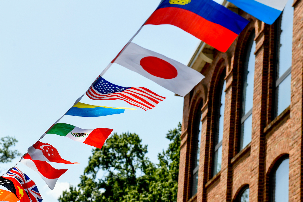 International flags fly in the Global Courtyard on main campus. Photo by Becky Kirkland.