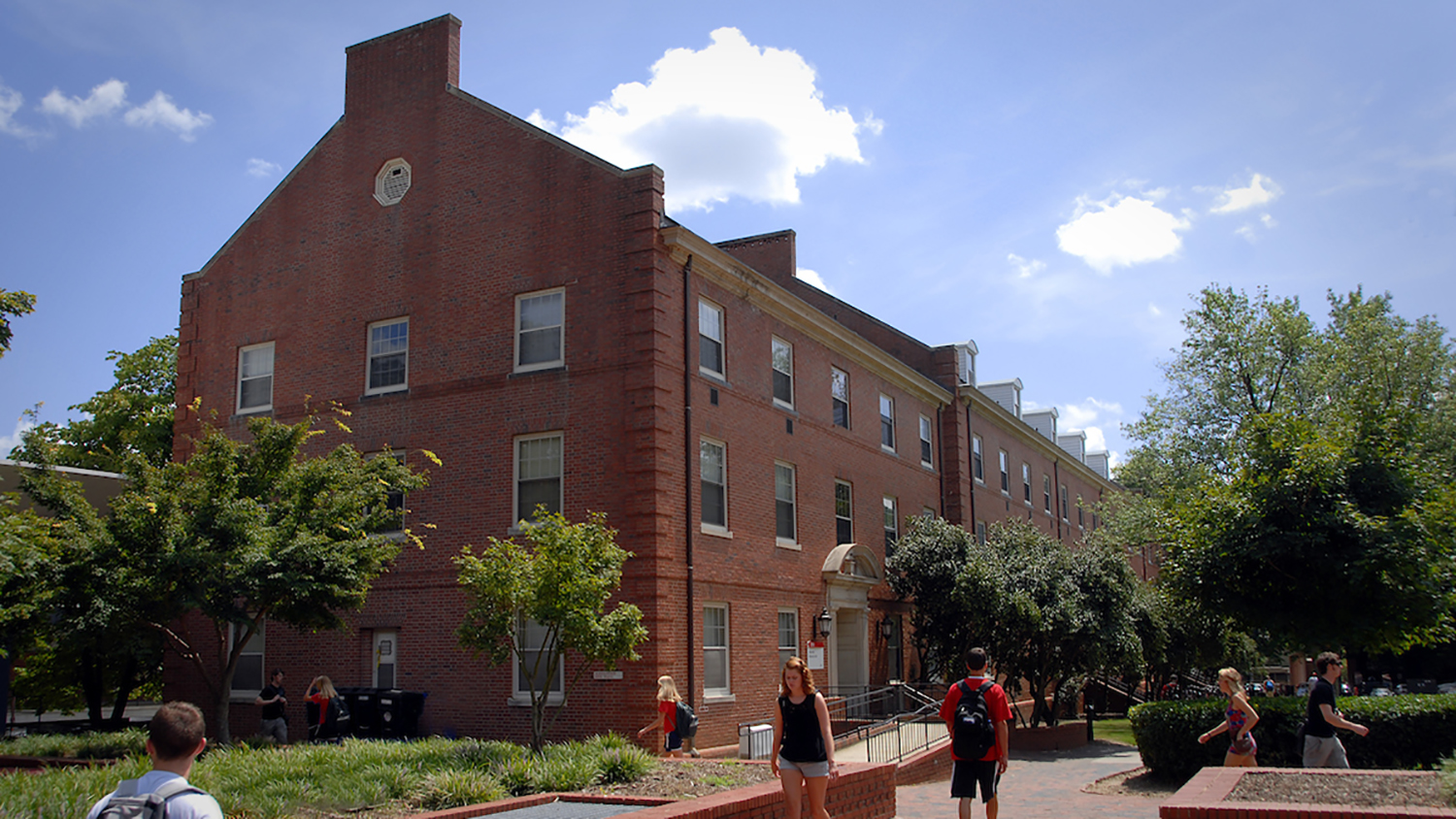 Students walk past Alexander Hall.