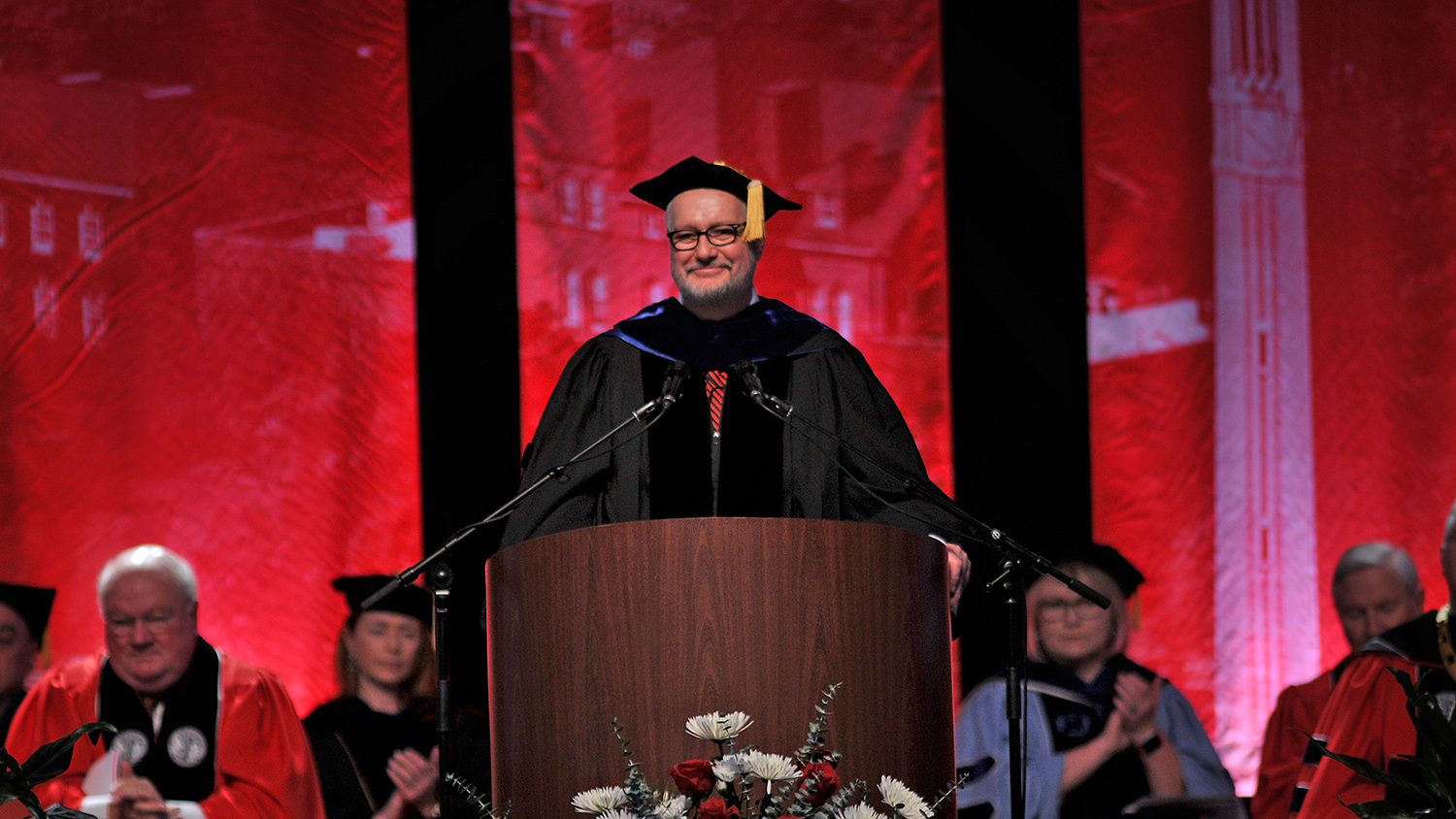 Provost Warwick Arden congratulates the new graduates.