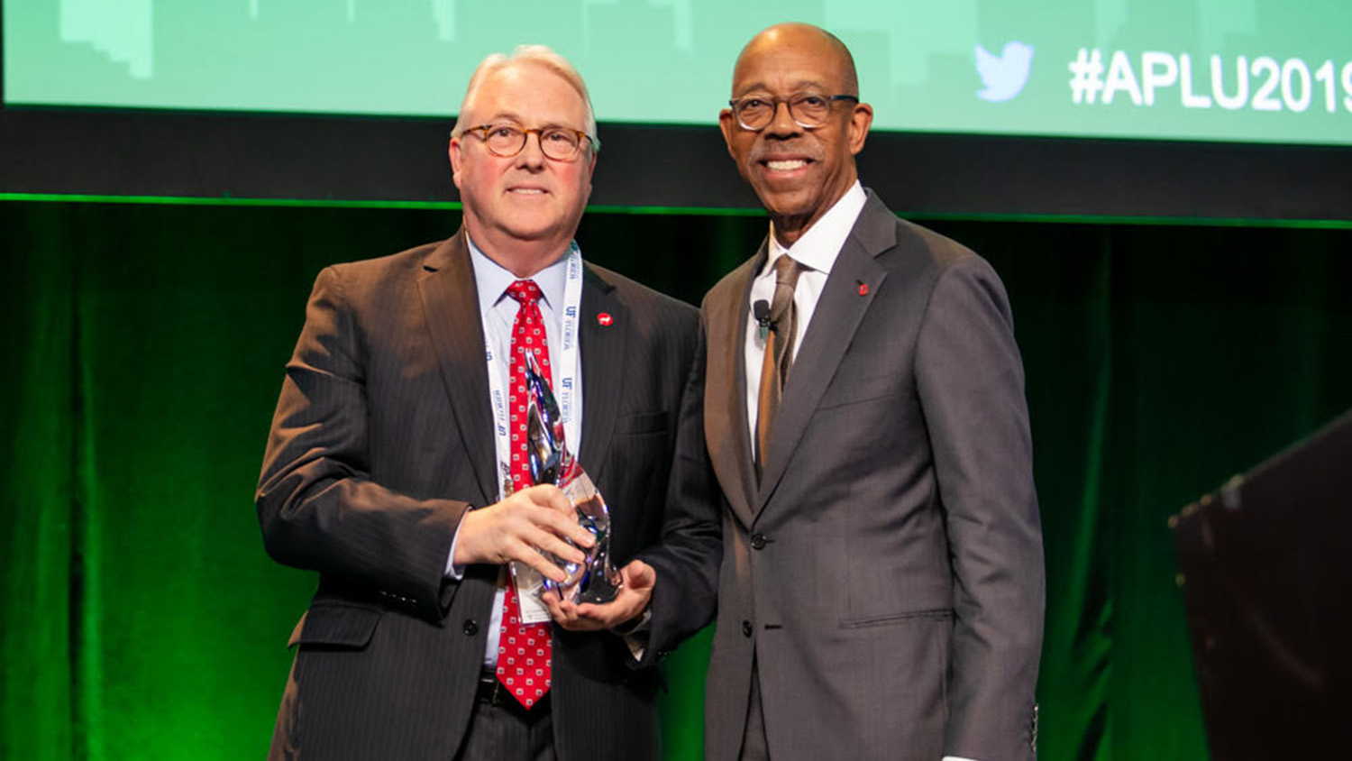 Chancellor Randy Woodson accepts the IEP Economic Engagement Connections award.