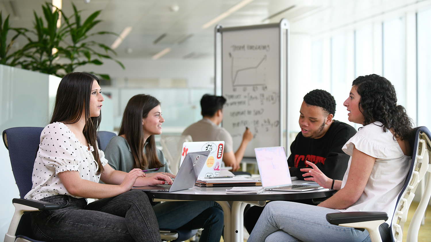 students meeting in the library