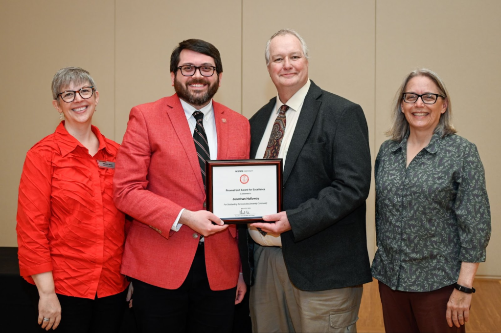 Photo of Jonathan Holloway with the provost and his supervisor.