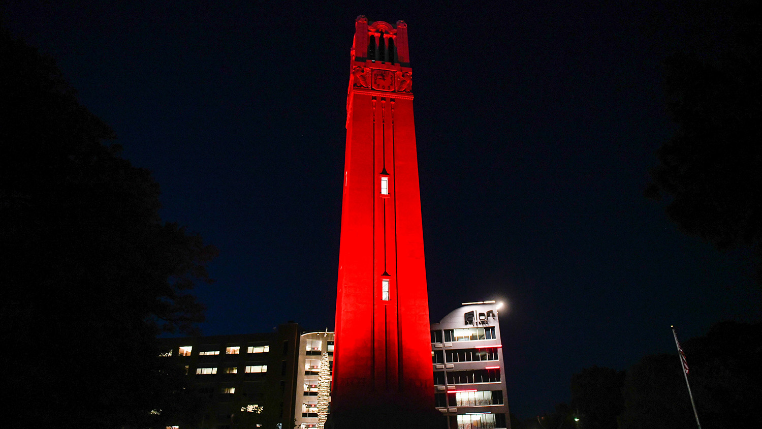 Memorial Belltower lit red