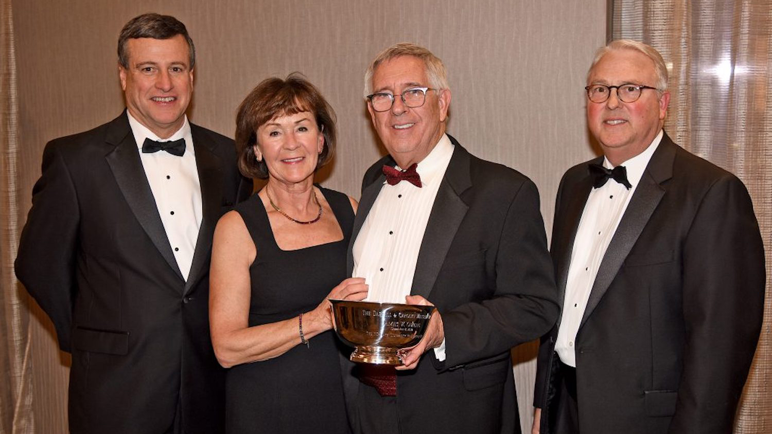 Former North Carolina State University Foundation Board Chair Trent Ragland and Chancellor Randy Woodson with Jim and Kathrine Owens at the 2017 Menscer Cup celebration.