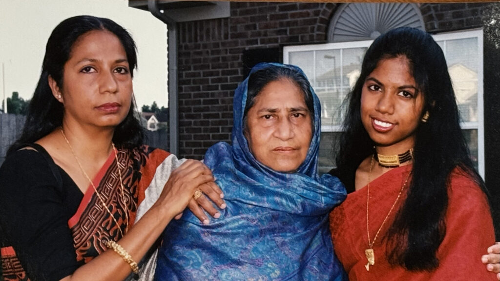 Taufika (right), her mother (left), and her grandmother (center) in 1996.